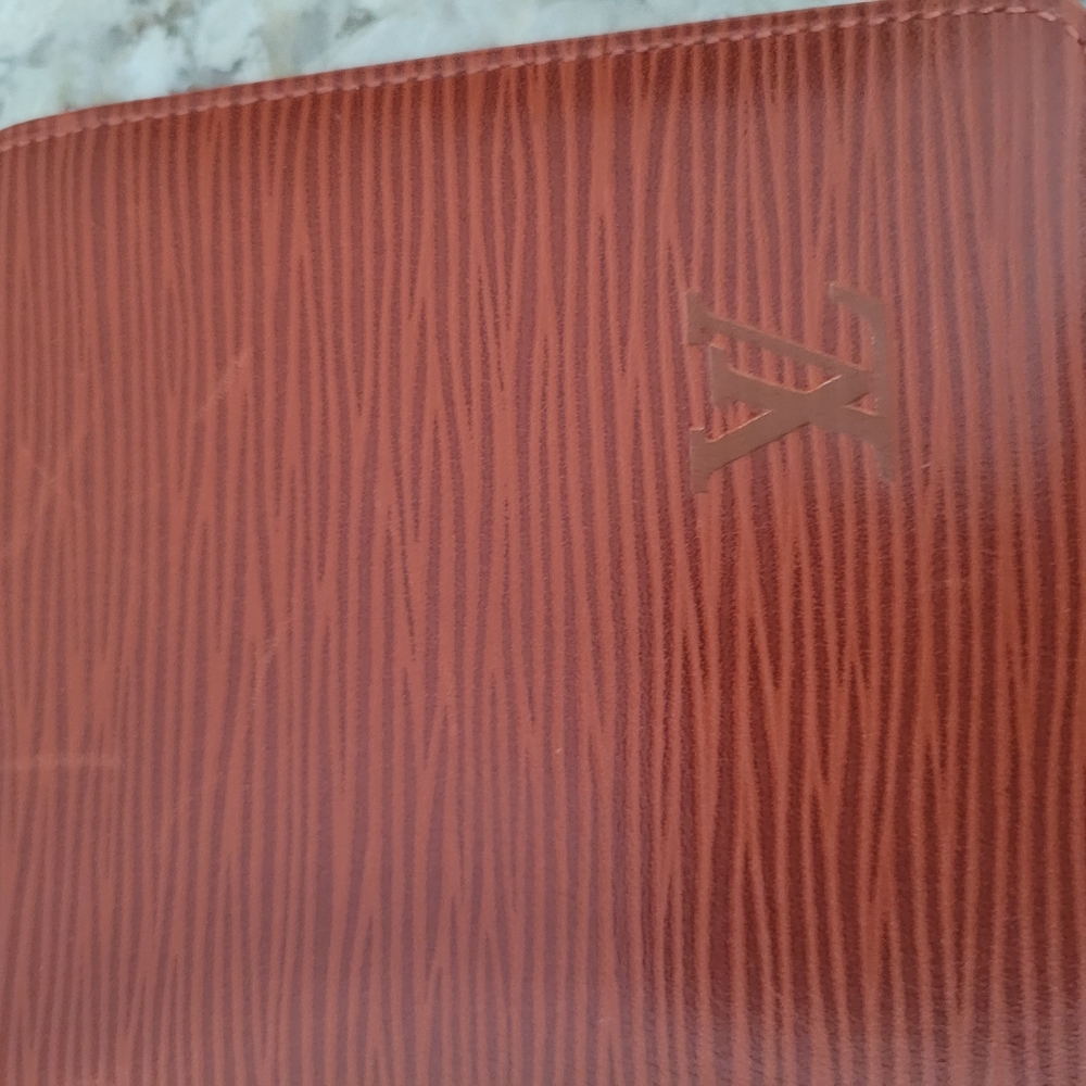 Louis Vuitton Brown Wallet with Elegant Embossed Texture